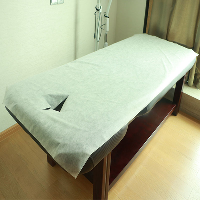 O rolo embalou a tampa de cama não tecida dos termas para a tabela do exame da massagem
